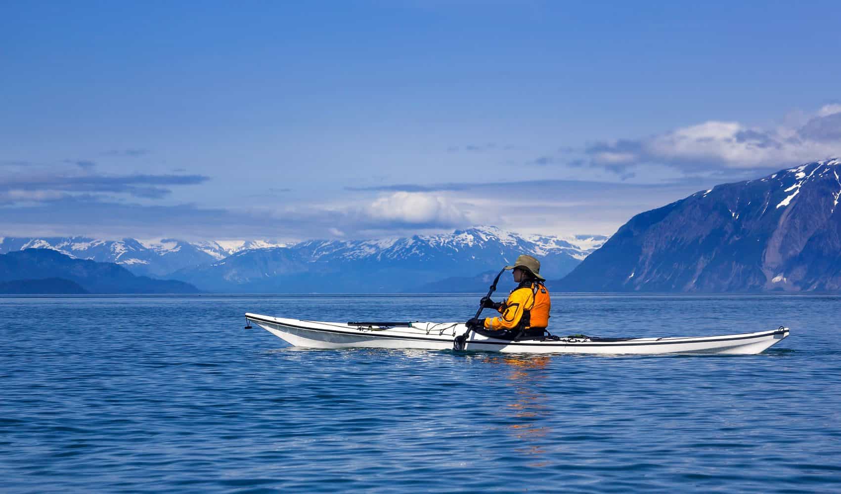 kayaker paddling National Park Alaska scaled 1