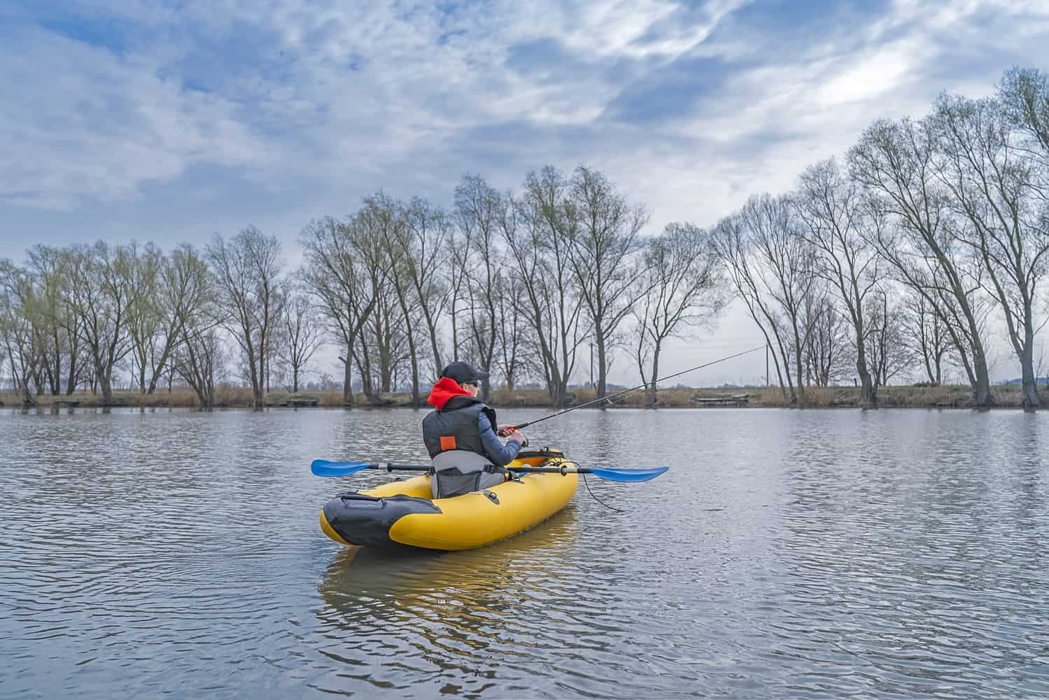 Fisher Woman With Inflatable Fishing Kayak